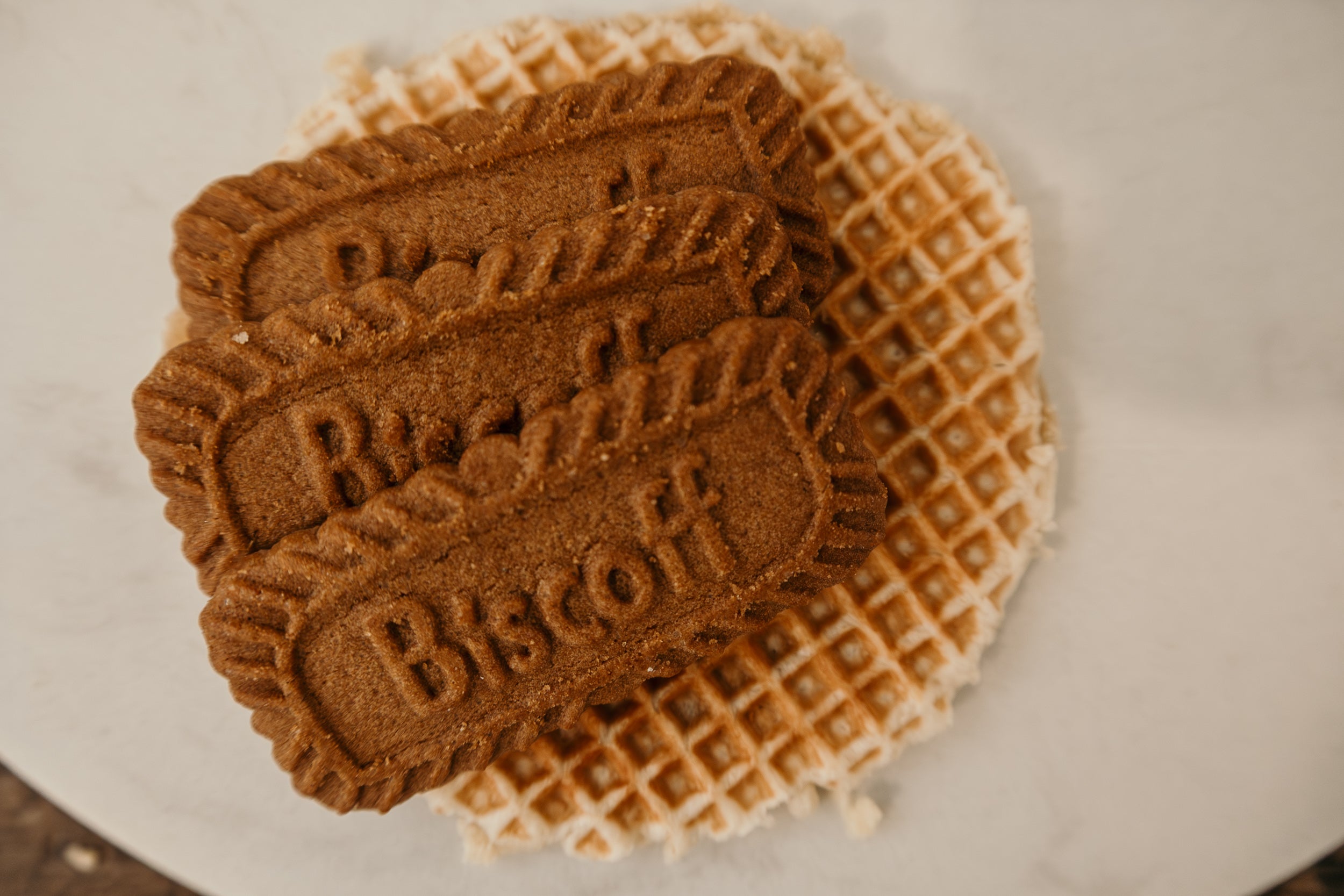Biscoff and waffle on a white plate